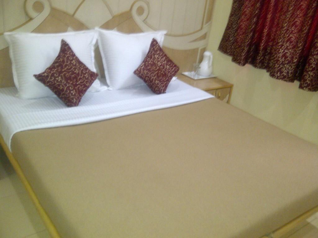 Hôtel Om Sai Palace à Pune Chambre photo